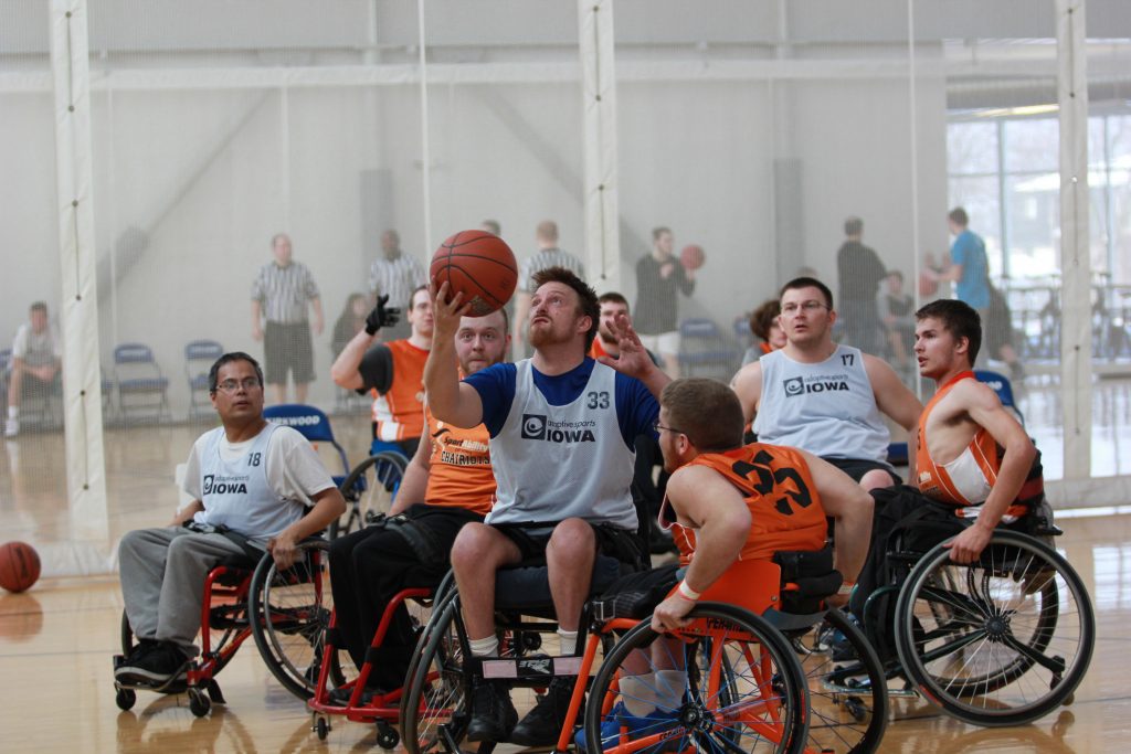 Two teams playing wheelchair basketball