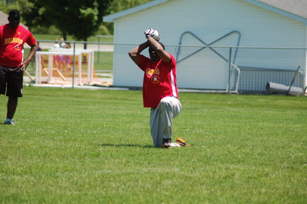 Man throwing ball in Beep Ball