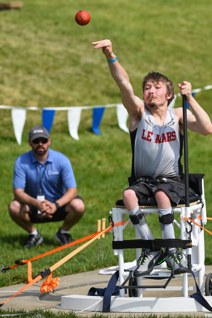 Track and field athlete throwing a shot-put